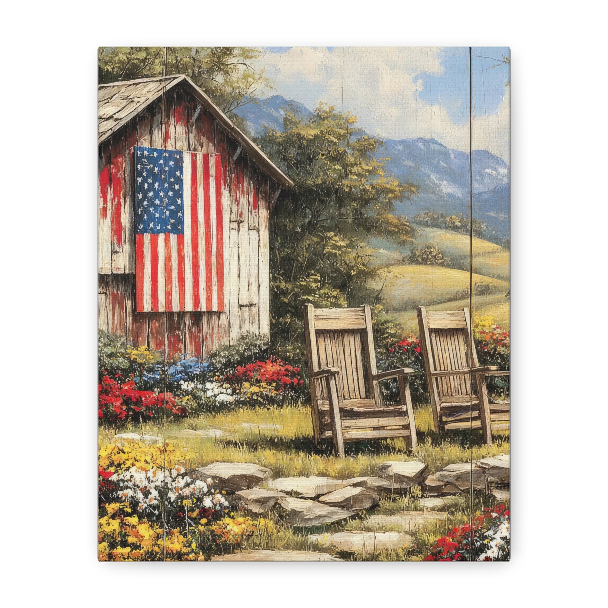 A vertical canvas wall art print depicting a rustic red barn with an American flag, two wooden chairs, and a scenic mountain valley in the background.